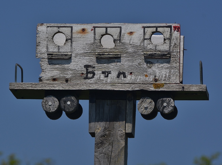 old wood train car on pole